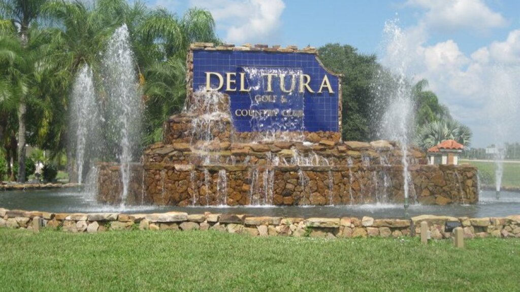 Golf course entrance sign with fountains